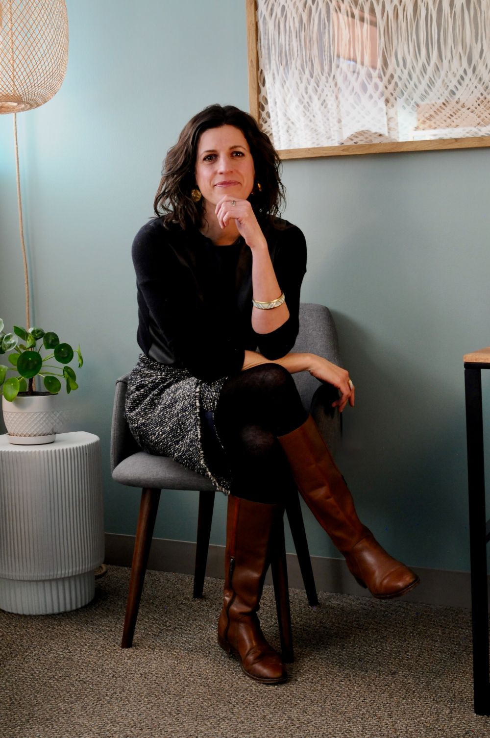 Portrait of Dr. Erika Enos seated in her office